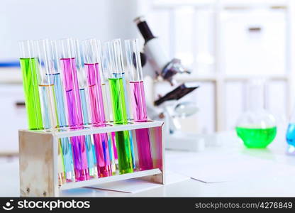 Chemistry laboratory glassware with colour liquids in them