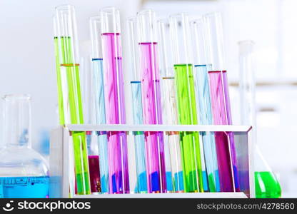 Chemistry laboratory glassware with colour liquids in them