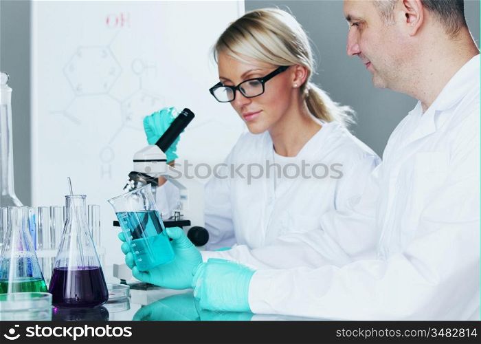 Chemistry Scientist conducting experiments in laboratory
