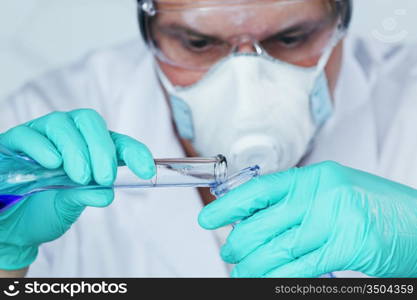 Chemistry Scientist conducting experiments in laboratory