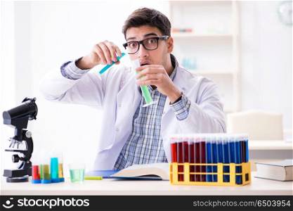 Chemistry student doing chemical experiments at classroom activi. Chemistry student doing chemical experiments at classroom activity. Chemistry student doing chemical experiments at classroom activi