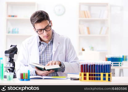 Chemistry student doing chemical experiments at classroom activity. Chemistry student doing chemical experiments at classroom activi