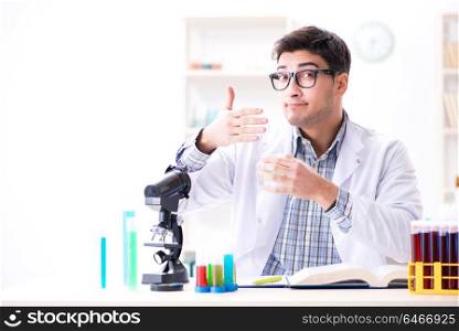 Chemistry student doing chemical experiments at classroom activity. Chemistry student doing chemical experiments at classroom activi