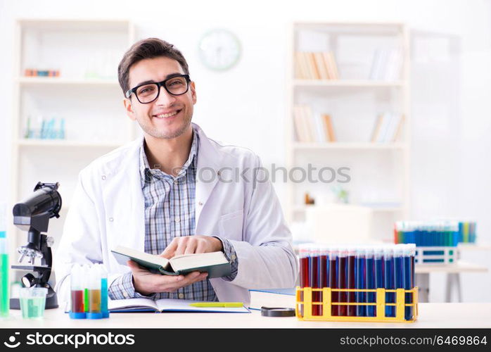 Chemistry student doing chemical experiments at classroom activity. Chemistry student doing chemical experiments at classroom activi