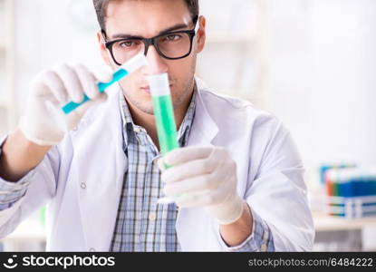 Chemistry student doing chemical experiments at classroom activity. Chemistry student doing chemical experiments at classroom activi