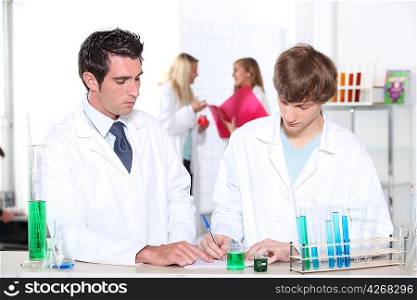 Chemistry teacher and student