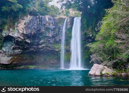 Cheonjiyeon waterfall falls one of tourist attractions of Jeju Island, South Korea. Cheonjiyeon falls, Jeju Island, South Korea