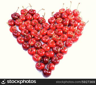 Cherries on white background - heart shape