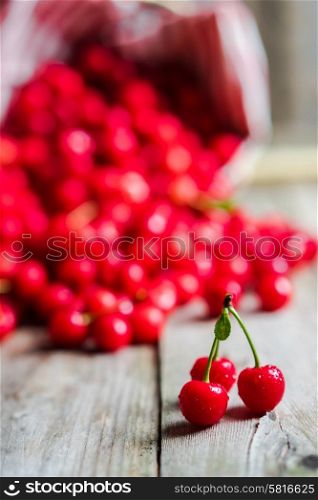 Cherries on wooden background