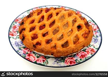 Cherry And Apple Pie. Fresh apple pie with red and green apples on a white background