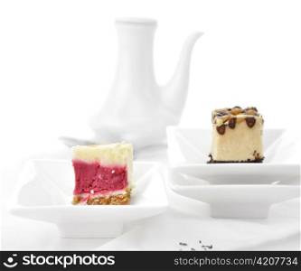 Cherry And Chocolate Cheesecake Slices In A White plates