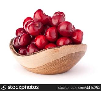 cherry berries in wooden bowl isolated on white background cutout