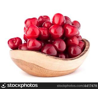 cherry berries in wooden bowl isolated on white background cutout
