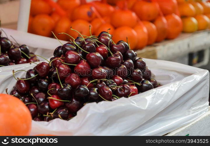 Cherry fruits for sale at market in Chinatown, Thailand