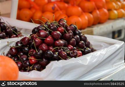Cherry fruits for sale at market in Chinatown, Thailand