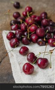 cherry fruits. fresh cherries on wooden table background
