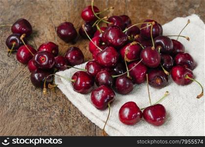 cherry fruits. fresh cherries on wooden table background