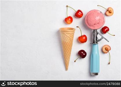 Cherry ice cream spoon with homemade icecram scoop with wafer cone on white table background topview flatlay with copy space