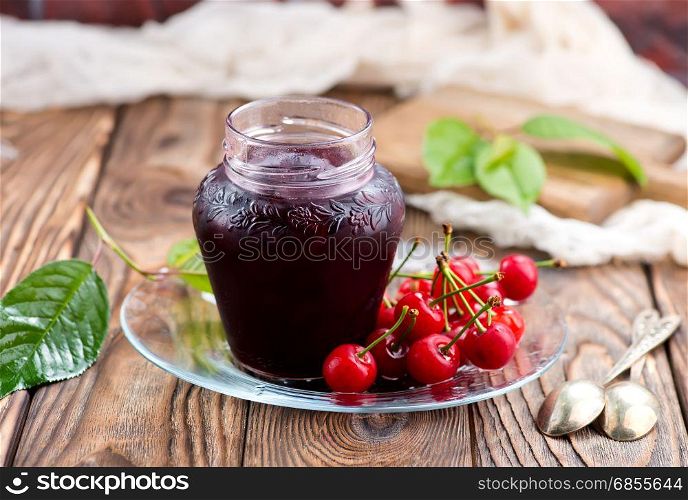 cherry jam in glass bank,stock photo