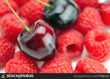 cherry on a background of raspberry