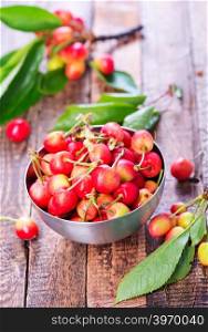 cherry on the wooden table, fresh cherry