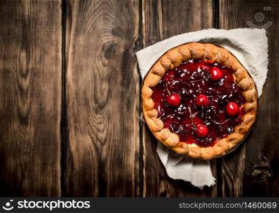 Cherry pie for old fabrics. On wood. Cherry pie for old fabrics.
