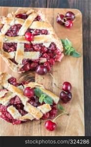 Cherry pie on the wooden board