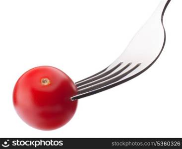 Cherry tomato on fork isolated on white background cutout. Healthy eating concept.