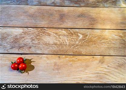 Cherry tomato on wooden table