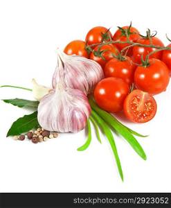 Cherry tomatoes and garlic on white background.