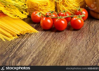 Cherry tomatoes. Cherry tomatoes and vegetables on kitchen table