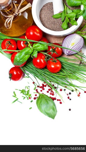 Cherry Tomatoes, chives and peppers on white