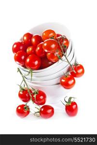 cherry tomatoes in a bowl on white background