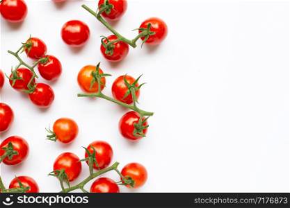 Cherry tomatoes on white background. Copy space