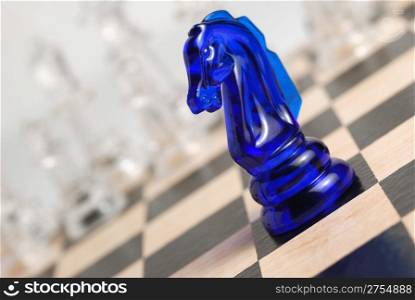Chess. A logic board game. A material - glass