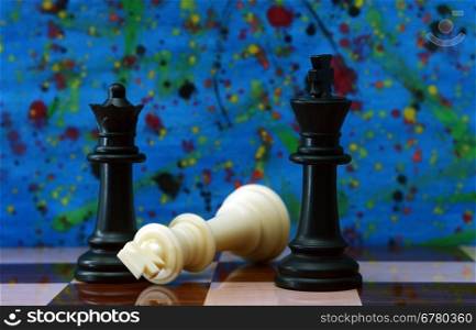 Chess against colorful background