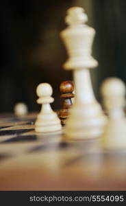 chess figures arranged on chess table closeup