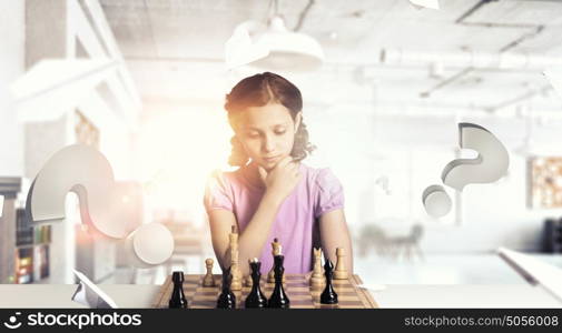 Chess game for clever mind. Young caucasian kid girl playing game of chess