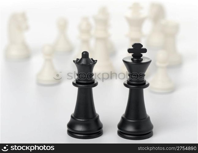 Chess king and queen. Black figures, concept of dialogue