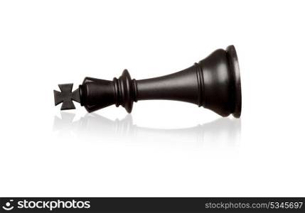 Chess piece king falling isolated on a white background