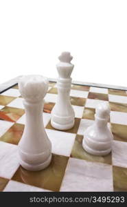 chess pieces on a board isolated on white background