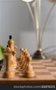 Chess pieces on board at home