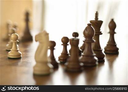 Chess pieces on chess board.