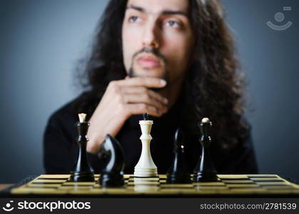 Chess player playing his game