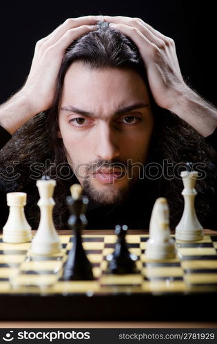 Chess player playing his game