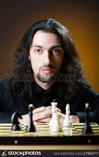 Chess player playing his game