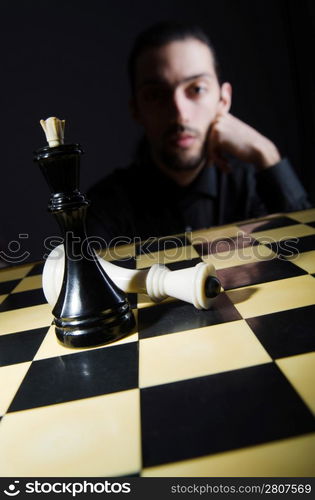 Chess player playing his game