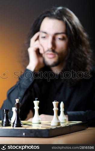 Chess player playing his game