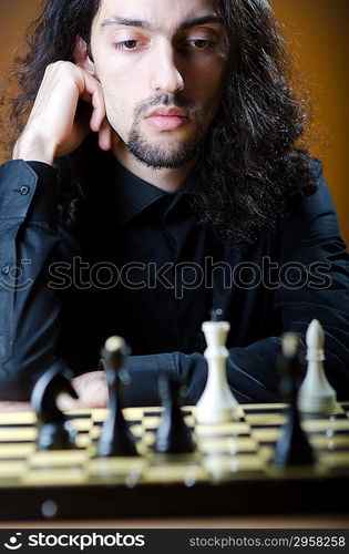 Chess player playing his game