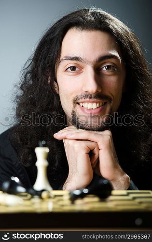 Chess player playing his game